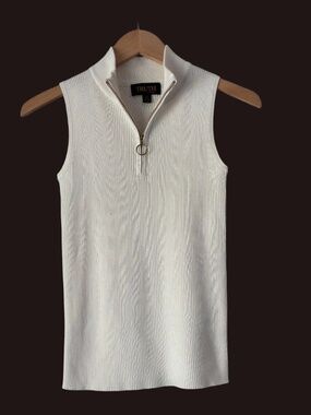 Truth Sleeveless 1/2 zip top.  Very cute.  Never worn!